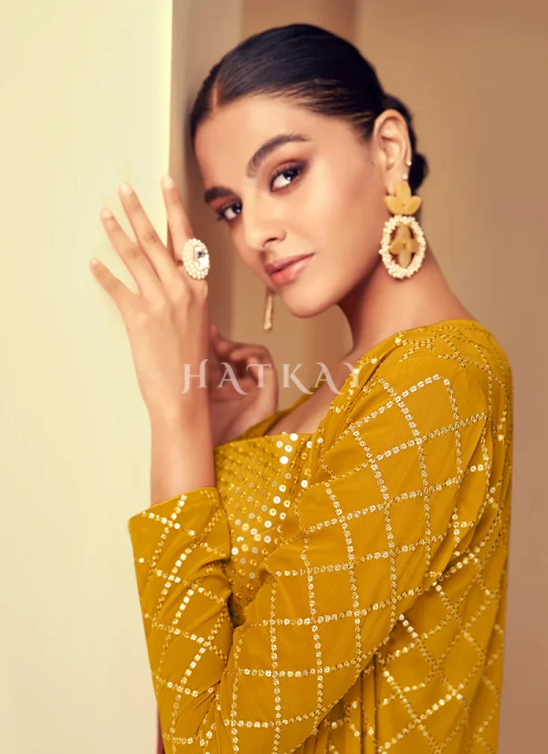 Yellow Sequence Embroidered Jacket Style Gharara Suit