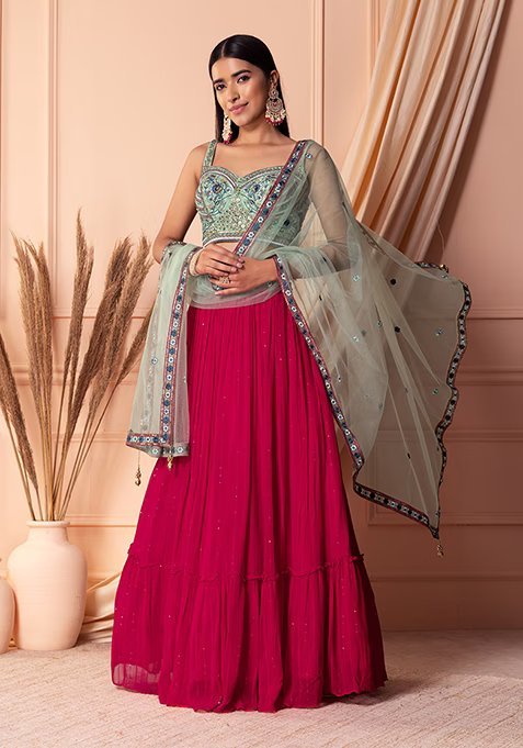 Peach lehenga in raw silk with contrast blouse in french knot and kundan  embroidery only on Kalki