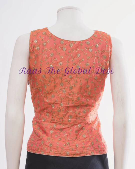 SILK PEPLUM BLOUSE WITH EMBROIDERY